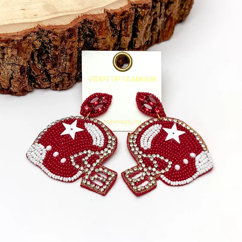 Hoop earrings with circle designs for a classic and timeless shape-Beaded Football Helmet Earrings with a Clear Crystal Outline in Maroon