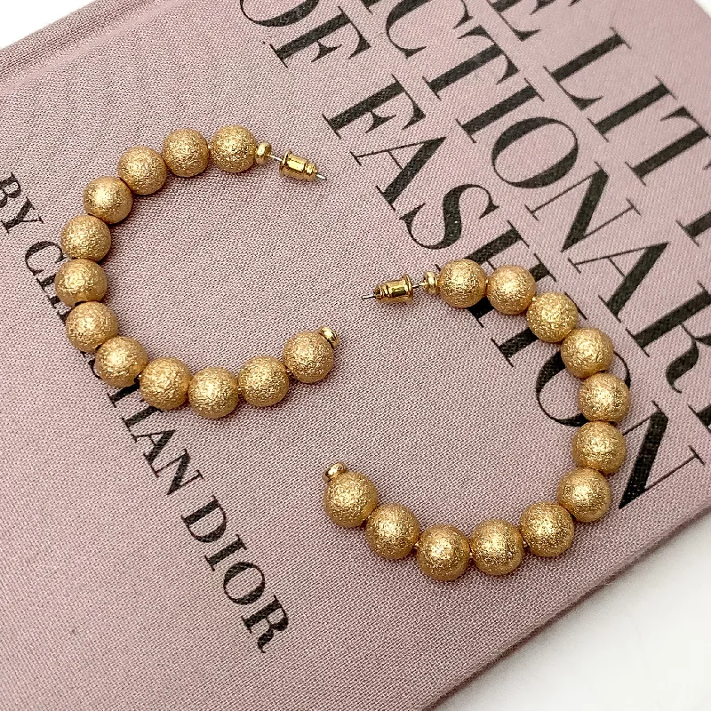 Hoop earrings with heart-shaped frames for a romantic and feminine look-Gold Tone Beaded Hoop Earrings