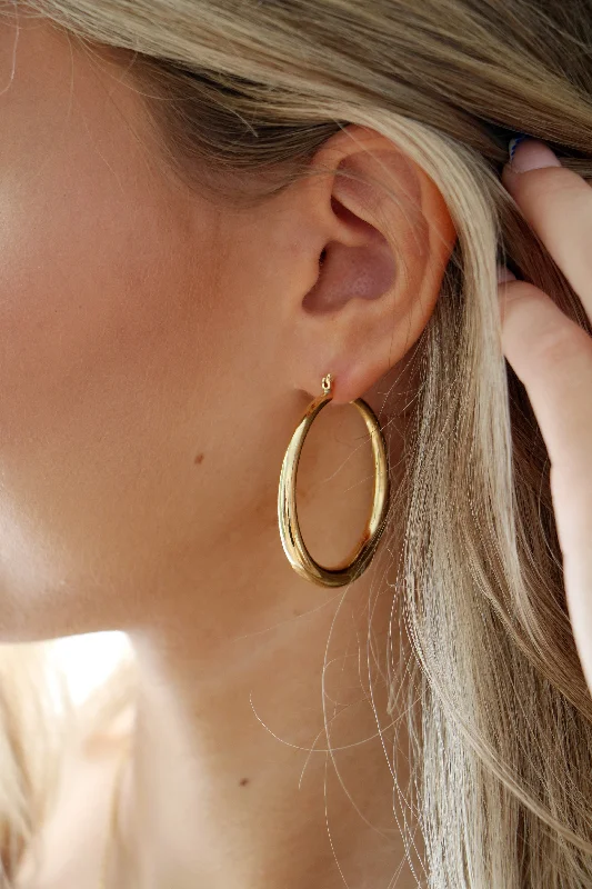 Hoop earrings with enamel stripes for a colorful and eye-catching design-oversized hoops { gold }