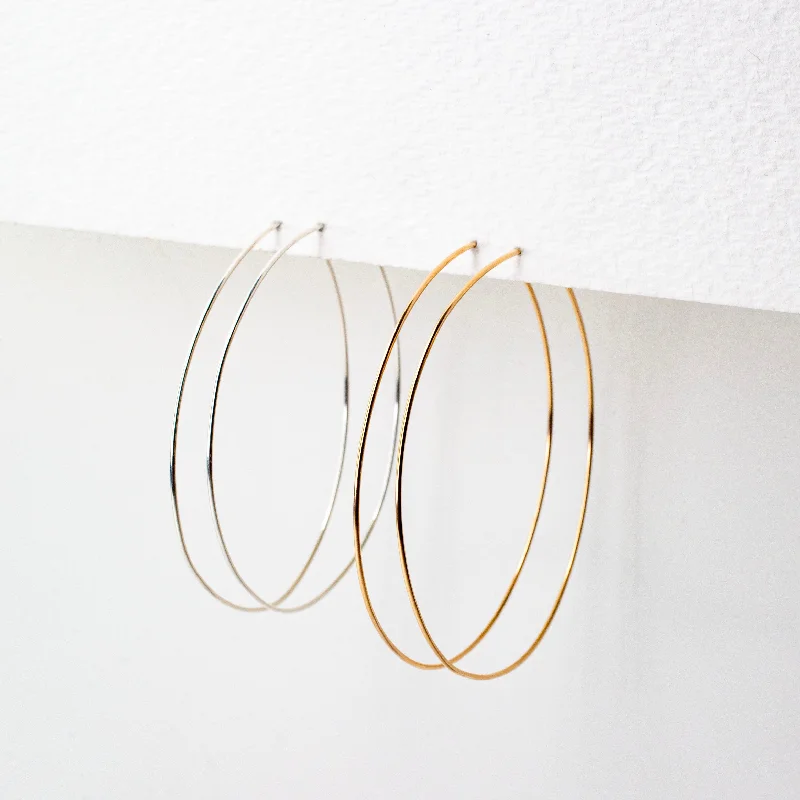 Best hoop earrings with gold-plated finishes for an affordable luxury vibe-Weightless Medium Hoops