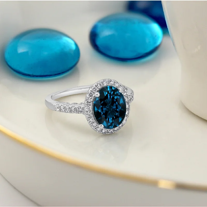 Rings with rough sapphire for rugged chic -Auriya 3ct Oval London Blue Topaz and Halo Diamond Engagement Ring 3/8ctw 14k Gold