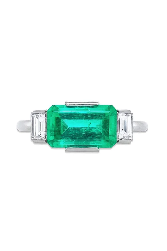 Platinum rings with sparkling sapphire center stones -Emerald Diamond Ring