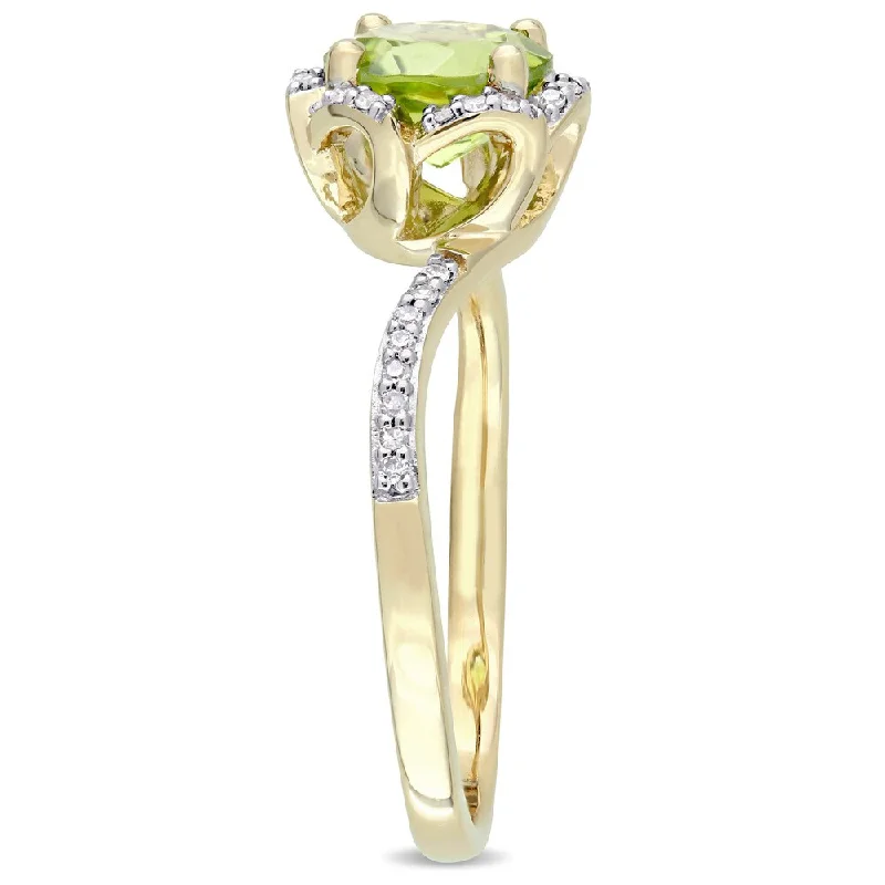 Rings with pave ruby for dazzling sparkle -Miadora Signature Collection 14k Yellow Gold Peridot and 1/10ct TDW Diamond Round Halo Bypass Slende - Green