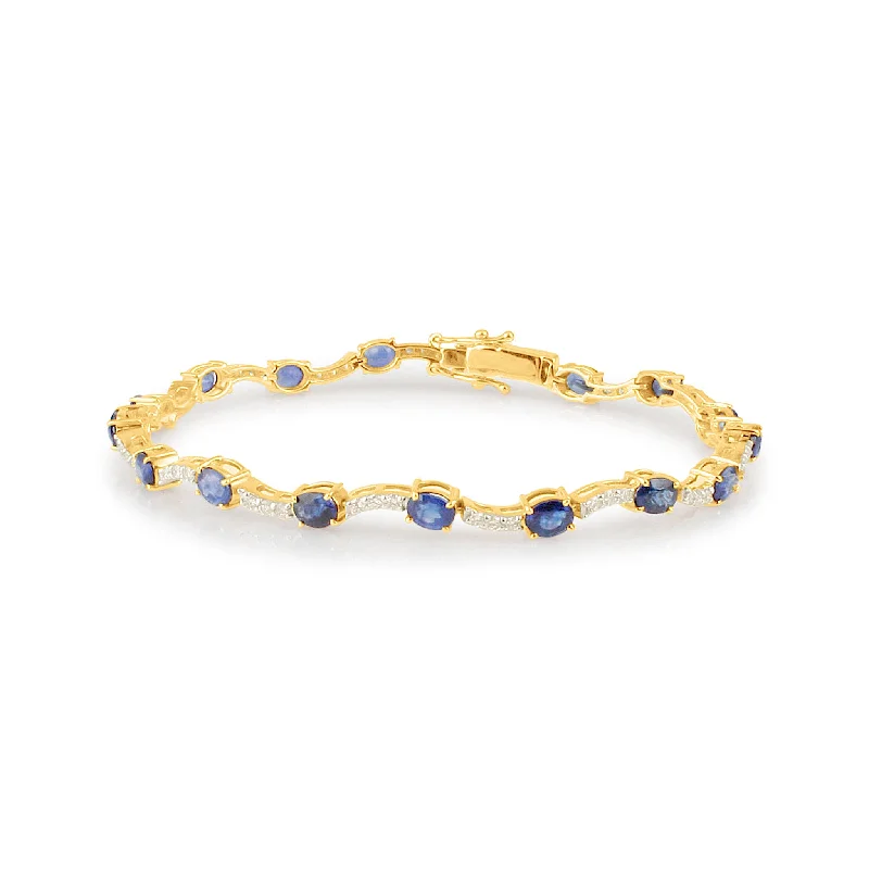 Luxury bangle bracelets with diamond accents for a sparkling, high-end accessory-Blue Sapphire Oval & Diamond Rd. Bracelet In 18K Yellow Gold