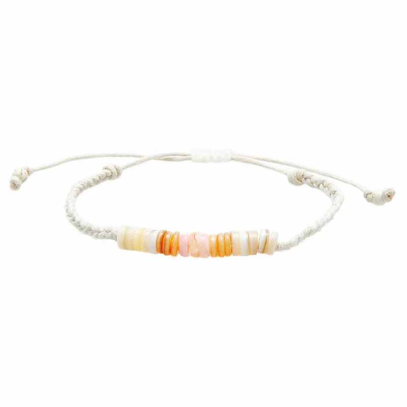 Art deco bangle bracelets with bold lines and shapes for a vintage-inspired flair-Brisa Braided Puka Shell Bracelet