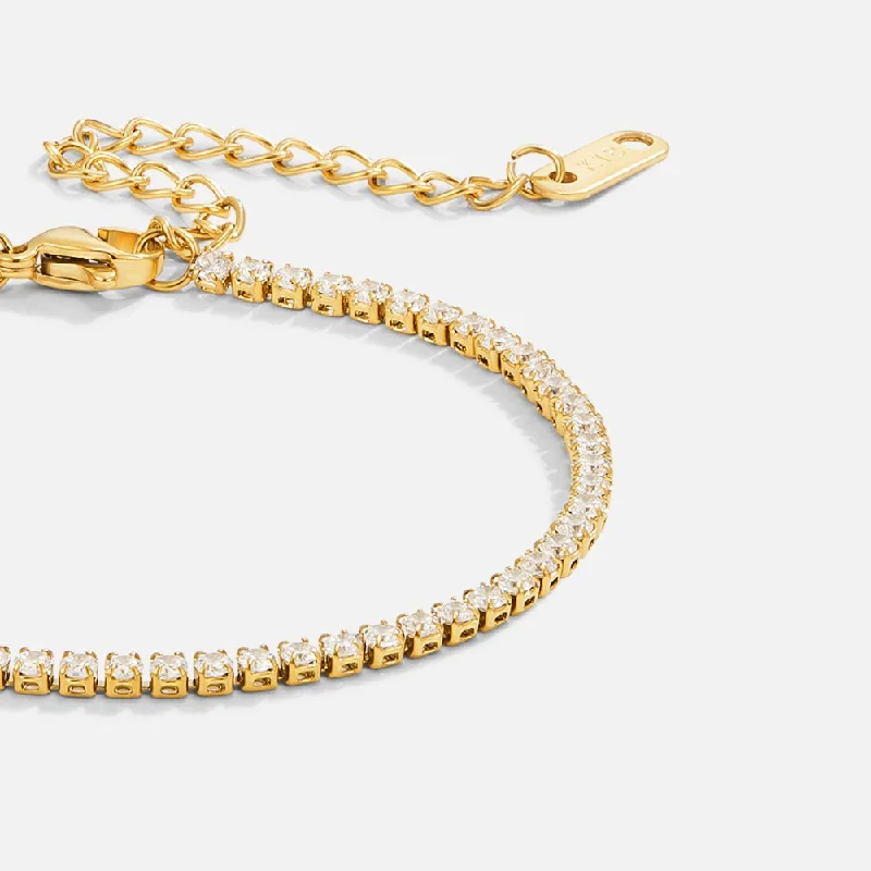 Vintage-inspired bangle bracelets with etched detailing for a timeless, antique look-Cordelia Gold Tennis Bracelet