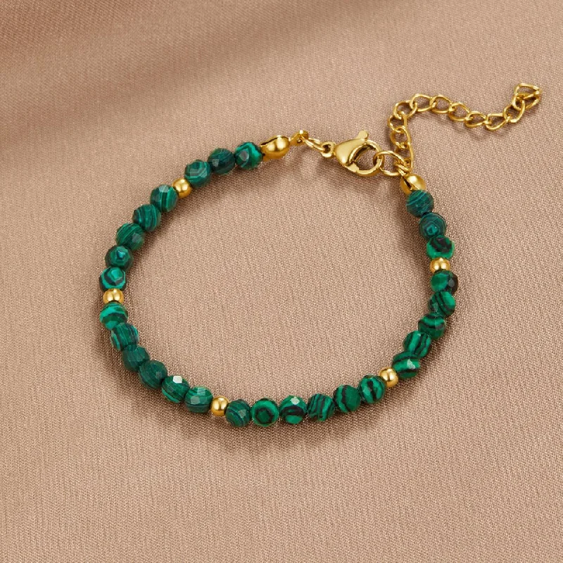 Best silver bangle bracelets with intricate detailing for a timeless and sophisticated style-Emerald Green Beaded Bracelet