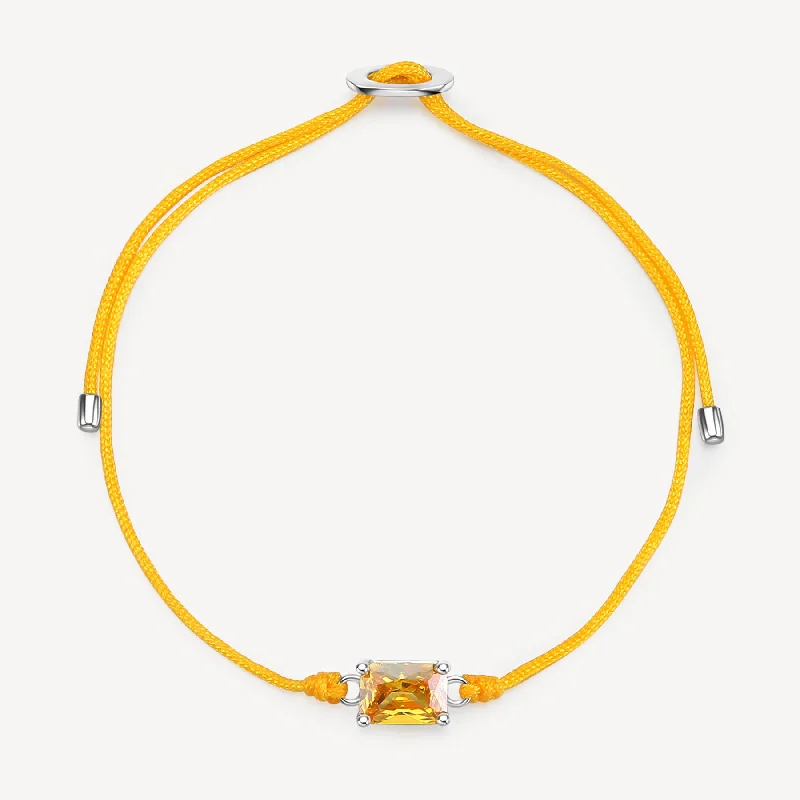 Sleek bangle bracelets with polished titanium for a modern and lightweight option-Fancy Yellow Stone Cord Bracelet in Sterling Silver