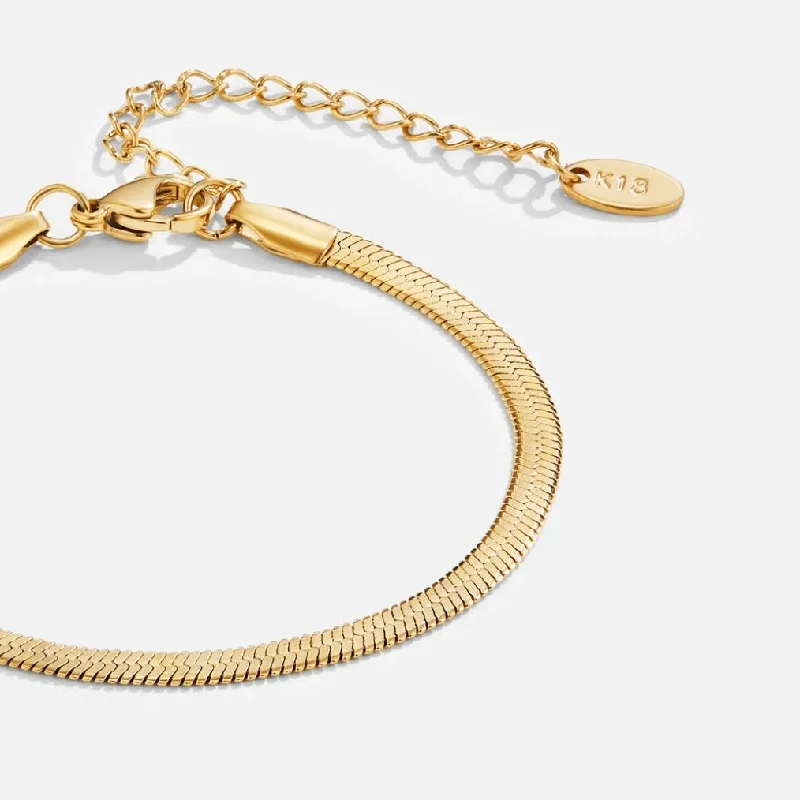 Bold bangle bracelets with textured finishes for a dynamic and modern style-Sarya Snake Chain Gold Bracelet