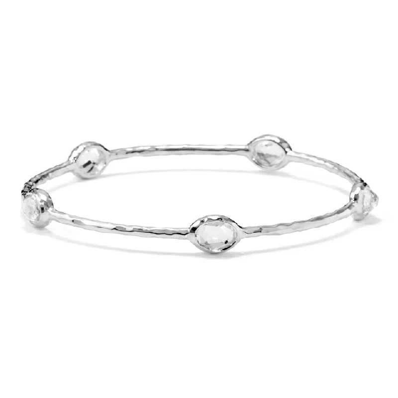 Art deco bangle bracelets with bold lines and shapes for a vintage-inspired flair-Rock Candy Clear Quartz Hammered Bangle